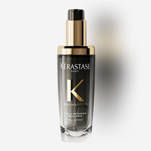 Chronologiste Huile de parfum hair oil is displayed on a pure grey background. The oil features an artful blend of addictive fragrances while providing hair shine and nourishment.